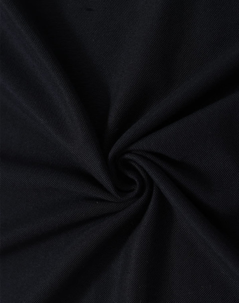 A close-up of black fabric in a swirling pattern, showcasing the texture and weave of the material.