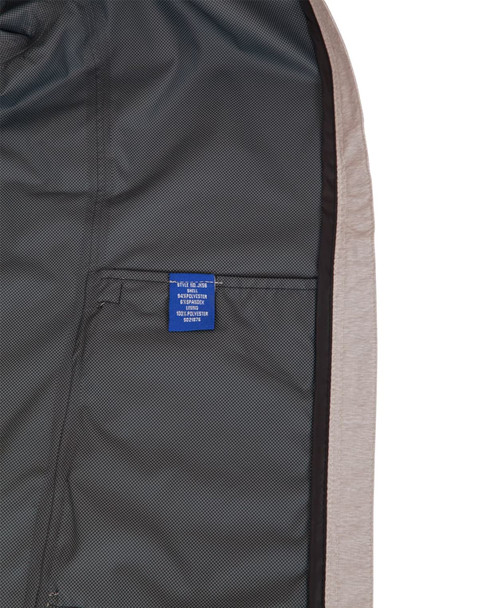 A men's waterproof performance jacket in grey with a mesh lining and a visible interior label.