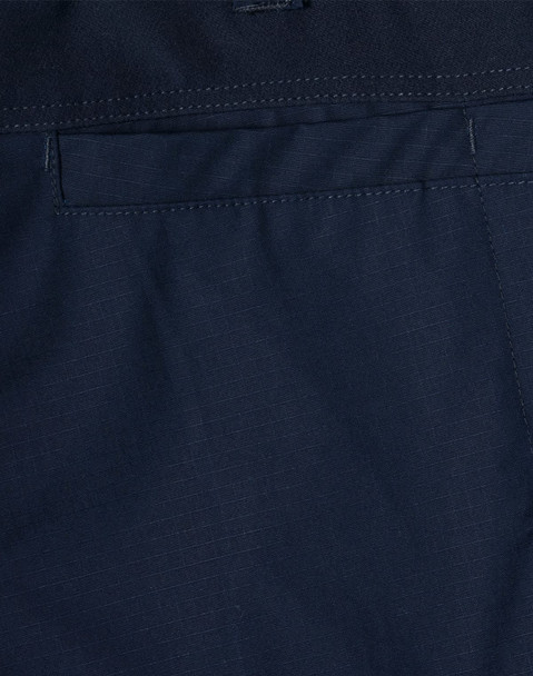 Navy rip-stop poly/cotton stretch work pants with a smooth fabric texture and a branding logo.