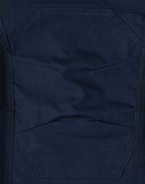 A close-up of dark navy rip-stop poly/cotton stretch work pants, featuring textured fabric and detailed stitching.