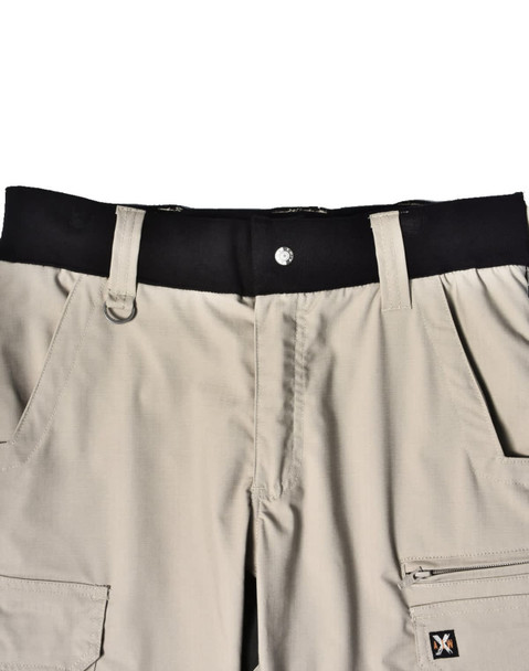 Rip-stop poly/cotton stretch work pants in beige with a black waistband and multiple pockets, featuring a logo.