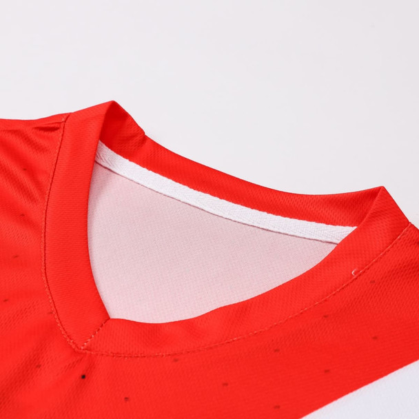 A red and white unisex polyester football jersey featuring a V-neck design and a subtle logo.