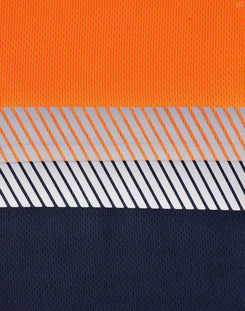 A segmented work polo shirt in vibrant orange and navy, featuring a reflective stripe design and a logo.