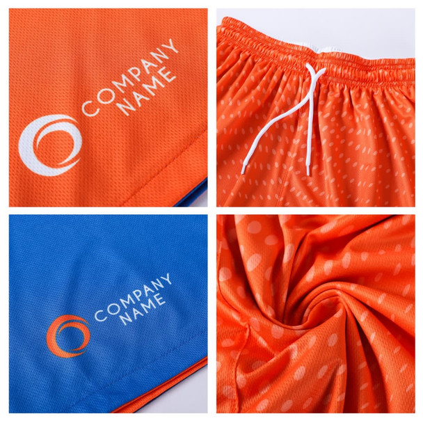Reversible basketball shorts featuring orange and blue designs, with a logo displayed on each side and a drawstring.