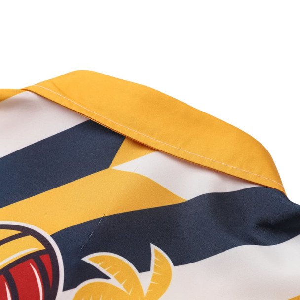 A close-up of a women's button-up shirt featuring yellow, blue, and white colours with a Hawaiian print and collar.