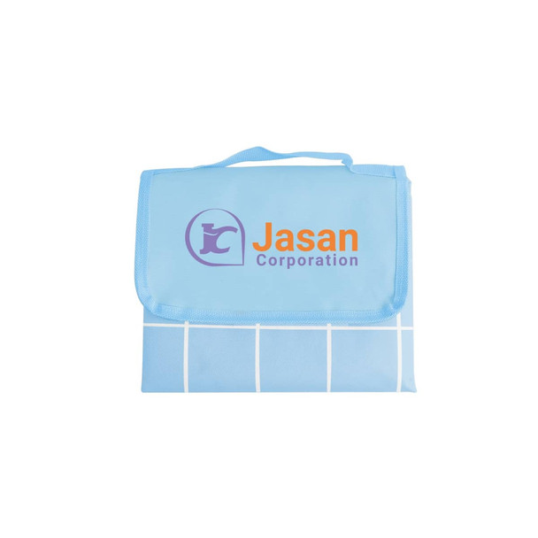 A medium picnic blanket in light blue with a grid pattern and a logo on the front.