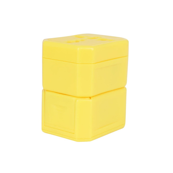 A yellow universal travel adapter kit featuring two stacked sections for different plug types.