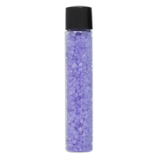 A clear bottle filled with purple bath salts, topped with a black lid.