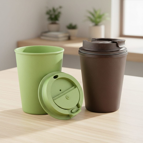 A drink bottle set featuring a green cup and a brown tumbler with a lid, presented on a wooden table.