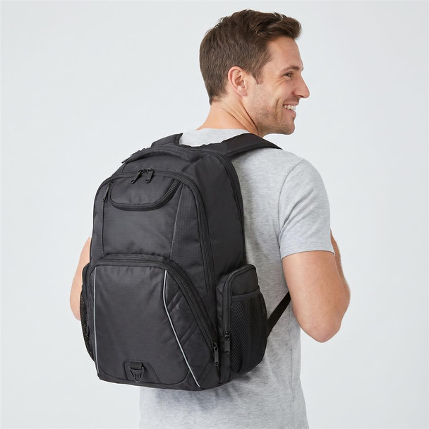 A black laptop backpack with multiple compartments, worn on the back of a person smiling. It features a logo.