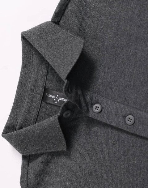 A dark grey ultrafine cotton pique polo with a two-button placket and folded collar. It features a logo on the label.