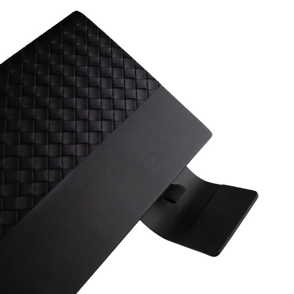 A black Nexus Notebook featuring a textured woven cover and a black elastic band for closure.