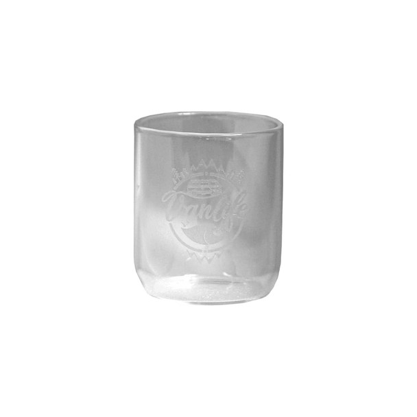 A clear glass cup featuring an etched design with the word "Vanlife" and a nature-inspired logo.