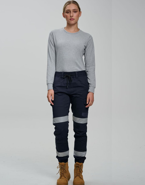 Cotton stretch drill cuffed work pants in navy blue with reflective tape, paired with a grey long-sleeve top.