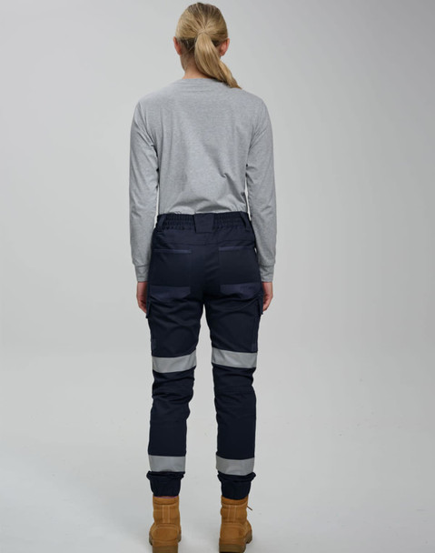 Cotton stretch drill cuffed work pants in navy, featuring reflective tape and a fitted design, viewed from the back.