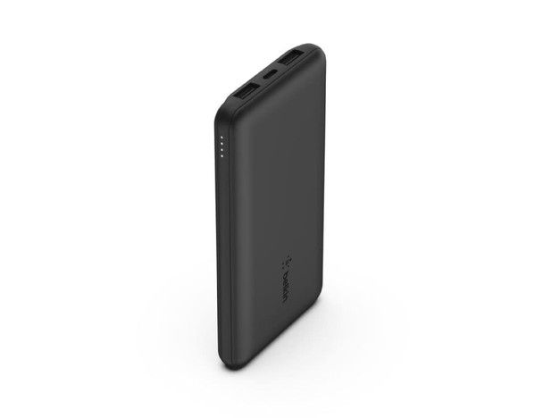 A black power bank with dual USB ports and four battery level indicator lights. It has a logo on the surface.