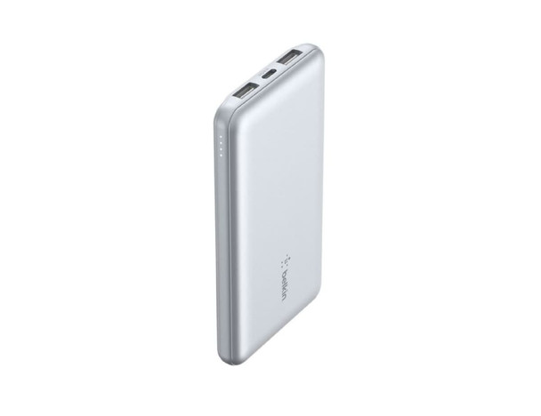 A silver power bank with two USB ports and LED indicators, featuring a logo on the side.