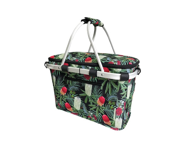 A floral-patterned insulated carry basket with a lid, featuring green, red, and black colours, and an exterior pocket.
