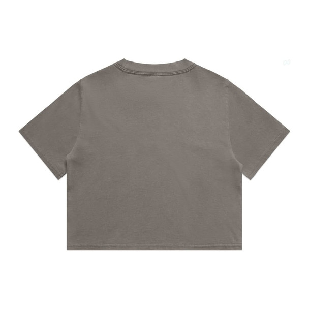 A heavy faded crop tee in a warm grey colour with a simple design and short sleeves. The shirt features a logo.