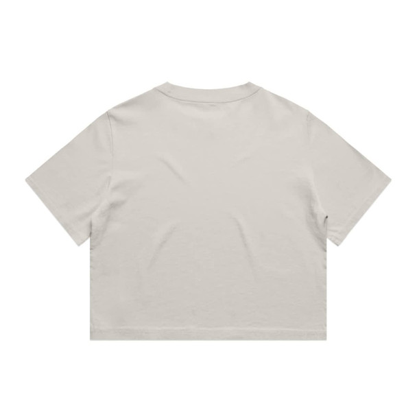 A heavy faded crop tee in a neutral beige colour, featuring short sleeves and a relaxed fit. The garment has a logo.