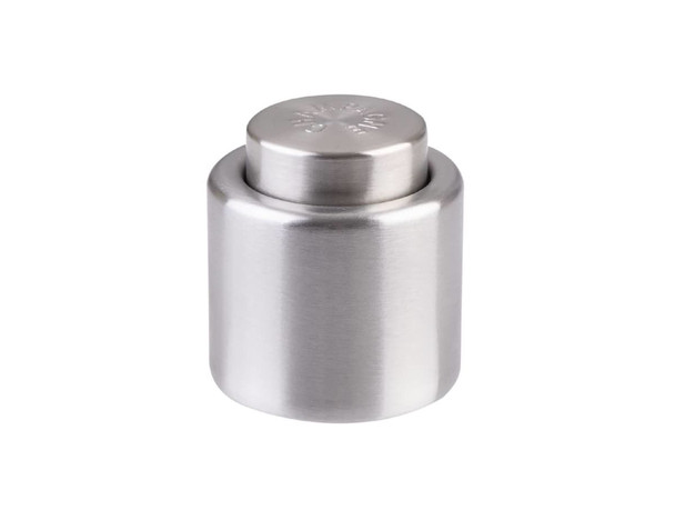A drink bottle stopper in stainless steel with a smooth, rounded top and a logo embossed on the surface.