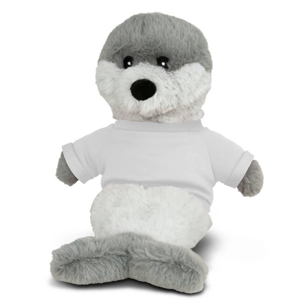 A grey and white plush seal toy wearing a blank white T-shirt, sitting upright. It has a cute, soft appearance.