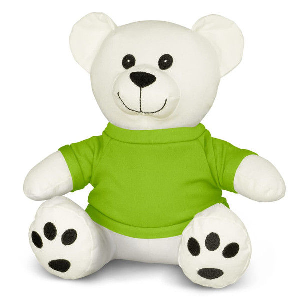 A plush toy bear with a white body and a green shirt, featuring black accents on the face and paws.