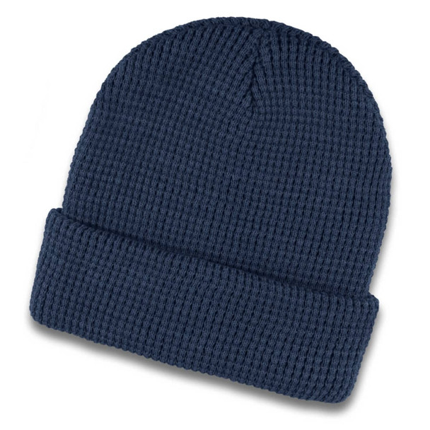 A navy blue waffle beanie featuring a textured knit design and a folded cuff. It has a small logo.