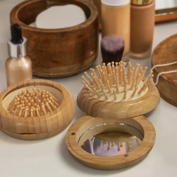 A bamboo brush and mirror set in natural tones, surrounded by beauty products and wooden accessories.