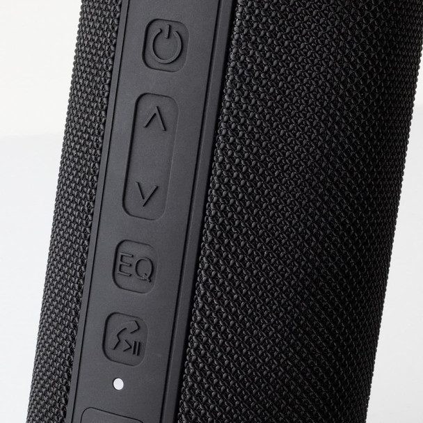 A black Bluetooth speaker featuring textured material and control buttons on the side. Contains a branding logo.