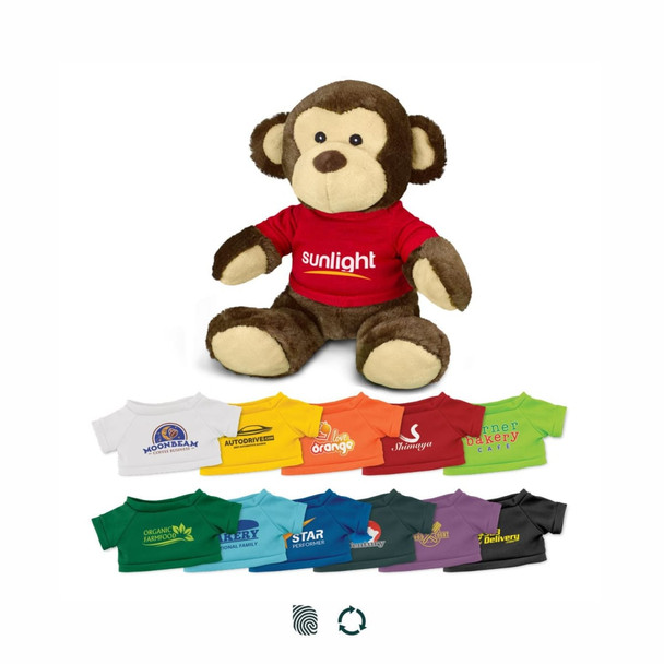 A plush monkey toy in brown and beige, wearing a red shirt with a logo and surrounded by various colourful t-shirts. A plush monkey toy in brown and beige, wearing a red shirt with a logo and surrounded by various colourful t-shirts.