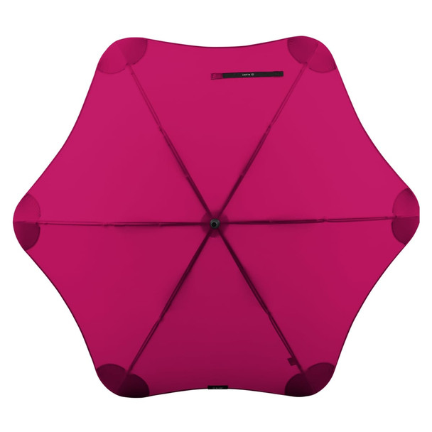 A fuchsia umbrella with a unique star shape and a central button, featuring a black logo. A fuchsia umbrella with a unique star shape and a central button, featuring a black logo.