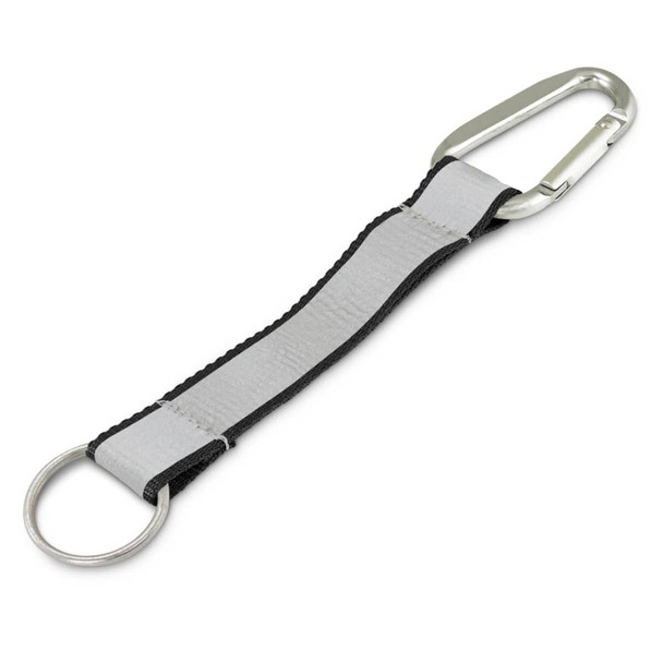 A grey reflector key ring with a silver carabiner and metal ring for attachment. Features a logo. A grey reflector key ring with a silver carabiner and metal ring for attachment. Features a logo.