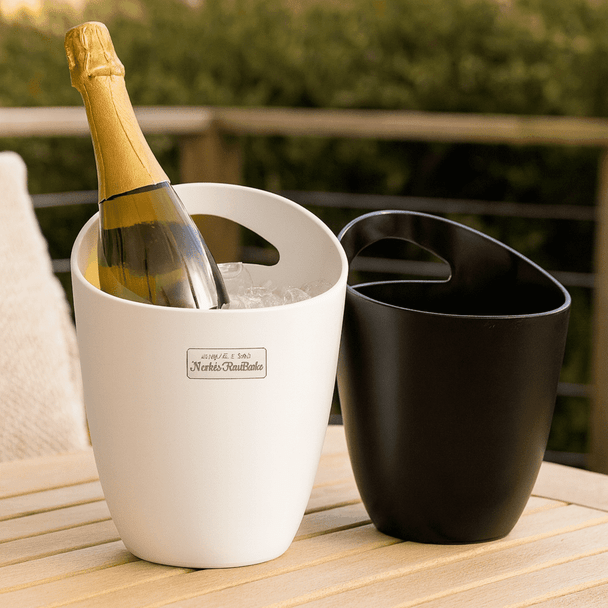 A white and black ice bucket pair, one holding a bottle of champagne surrounded by ice. Each bucket has a handle.