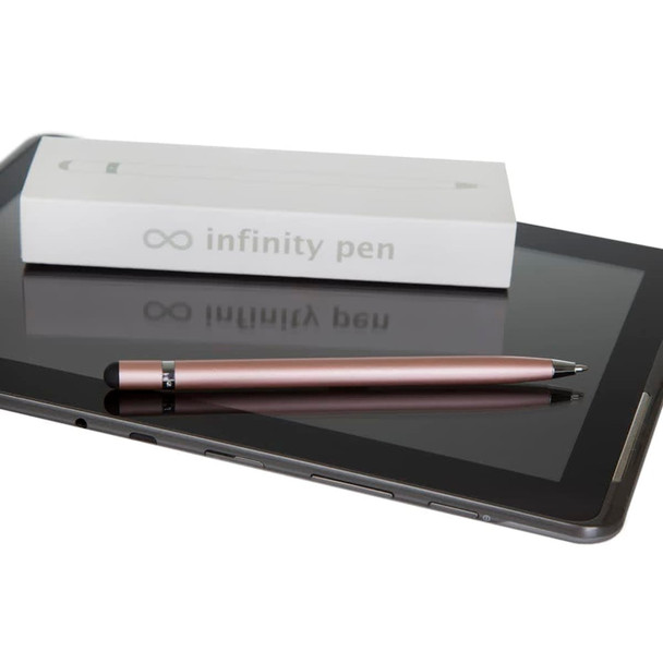 A metal pen in rose gold colour placed on a tablet, next to a white box with a logo. A metal pen in rose gold colour placed on a tablet, next to a white box with a logo.