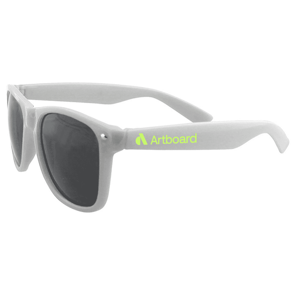 A pair of grey sunglasses with dark lenses and a logo on the arm, suitable for leisure and outdoor activities.