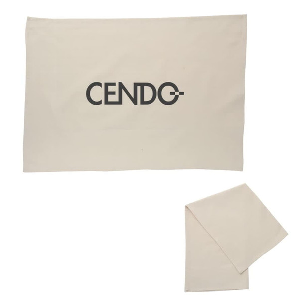 A cream cotton tea towel featuring a logo. The towel is neatly folded beside a larger flat section. A cream cotton tea towel featuring a logo. The towel is neatly folded beside a larger flat section.