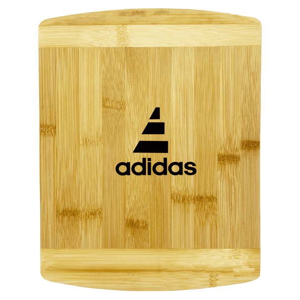 A bamboo cutting board featuring a sleek design with a logo. The board has a natural finish with a smooth surface.