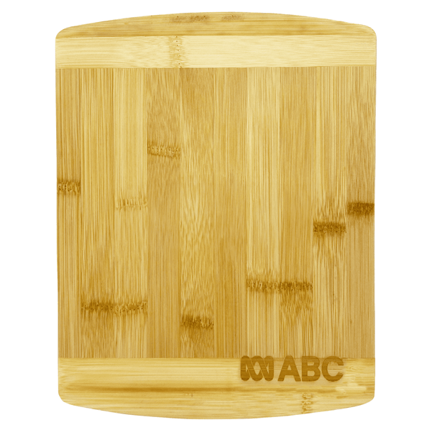 A bamboo cutting board with a smooth surface and rounded edges, featuring a logo in one corner.