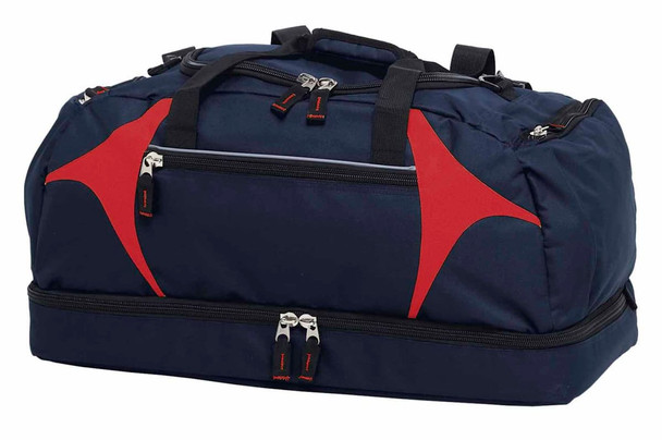 A navy blue duffle bag with red accents, featuring multiple zippers and carrying handles, plus a logo.