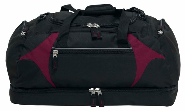 A large black duffle bag with maroon accents and multiple zippered compartments. It features handles and a logo.