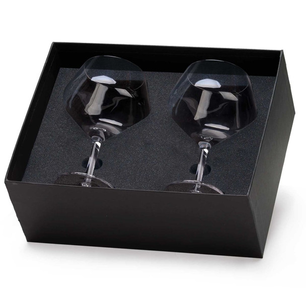 A glass set in a black box containing two stemmed glasses, showcasing a clear design with a sleek finish.