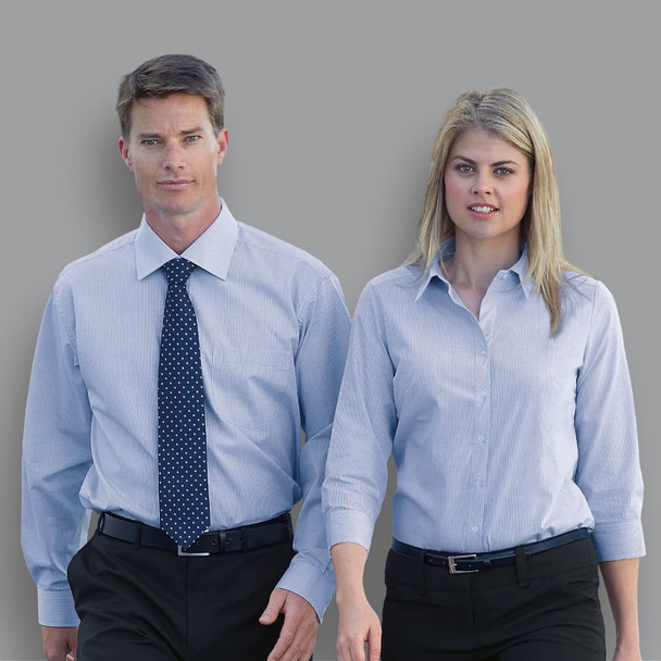 A button-up shirt for women in light blue, featuring a sleek design and a logo.