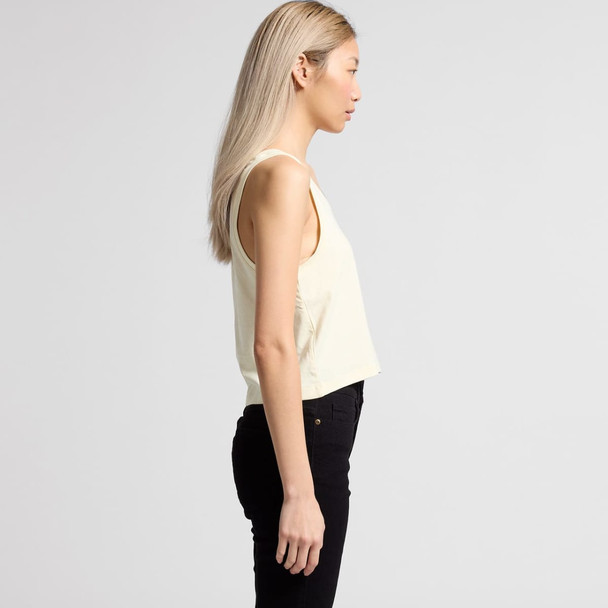 A side view of a women's cropped singlet in a soft yellow colour, featuring a simple design and a logo. A side view of a women's cropped singlet in a soft yellow colour, featuring a simple design and a logo.