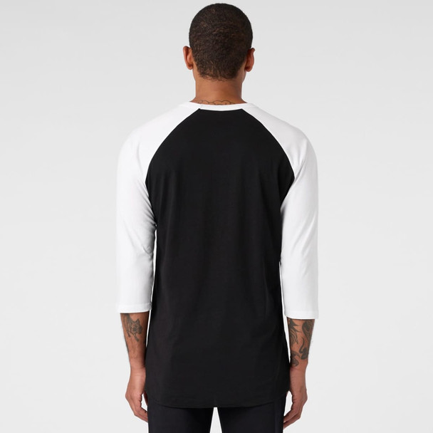 A black and white raglan tee with three-quarter sleeves, featuring a logo on the back.