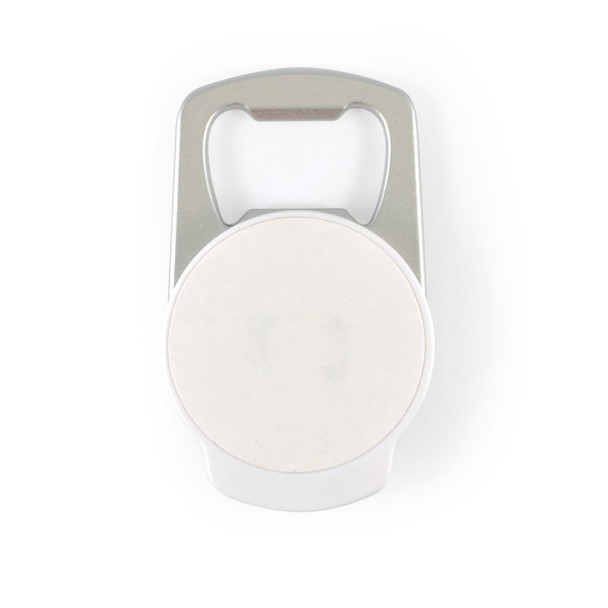 A drink bottle opener phone stand in silver and white, featuring a circular space in the center and a logo.