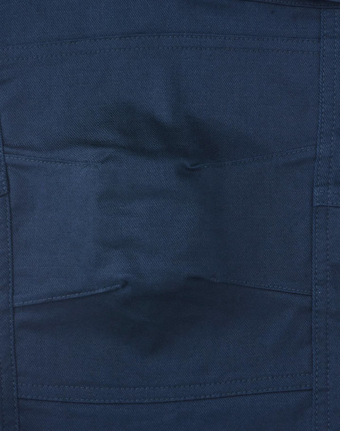 Navy unisex cotton stretch ripstop work pants with multiple pockets and a logo detail.