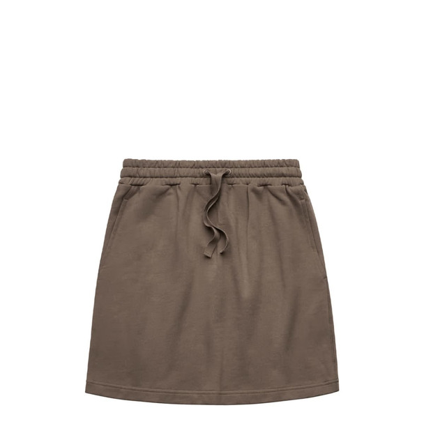 A terry skirt in olive green with an elastic waistband and drawstring. It includes a logo on the waistband.