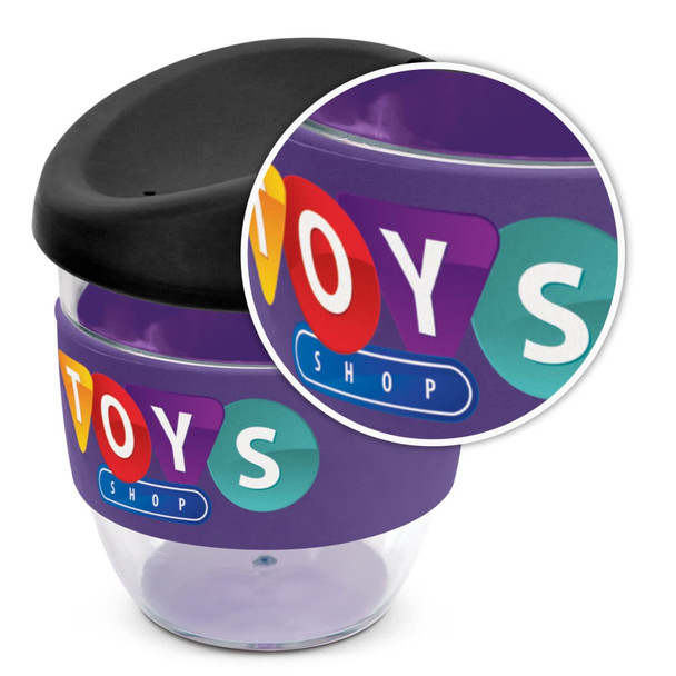 A drink bottle featuring a clear body with a black lid and purple silicone sleeve, decorated with multi-coloured circles.