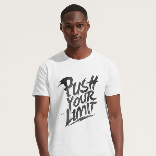 A white adult t-shirt featuring a bold graphic design with the phrase "Push Your Limit." The shirt has a branding logo.